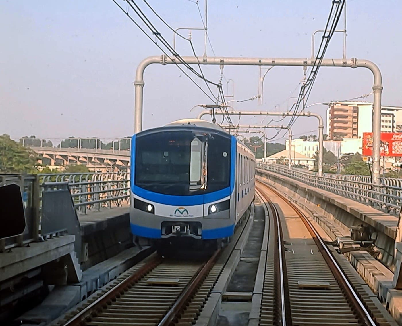 Ho Chi Minh City Metro Line 1 train on the elevated track near National University station
