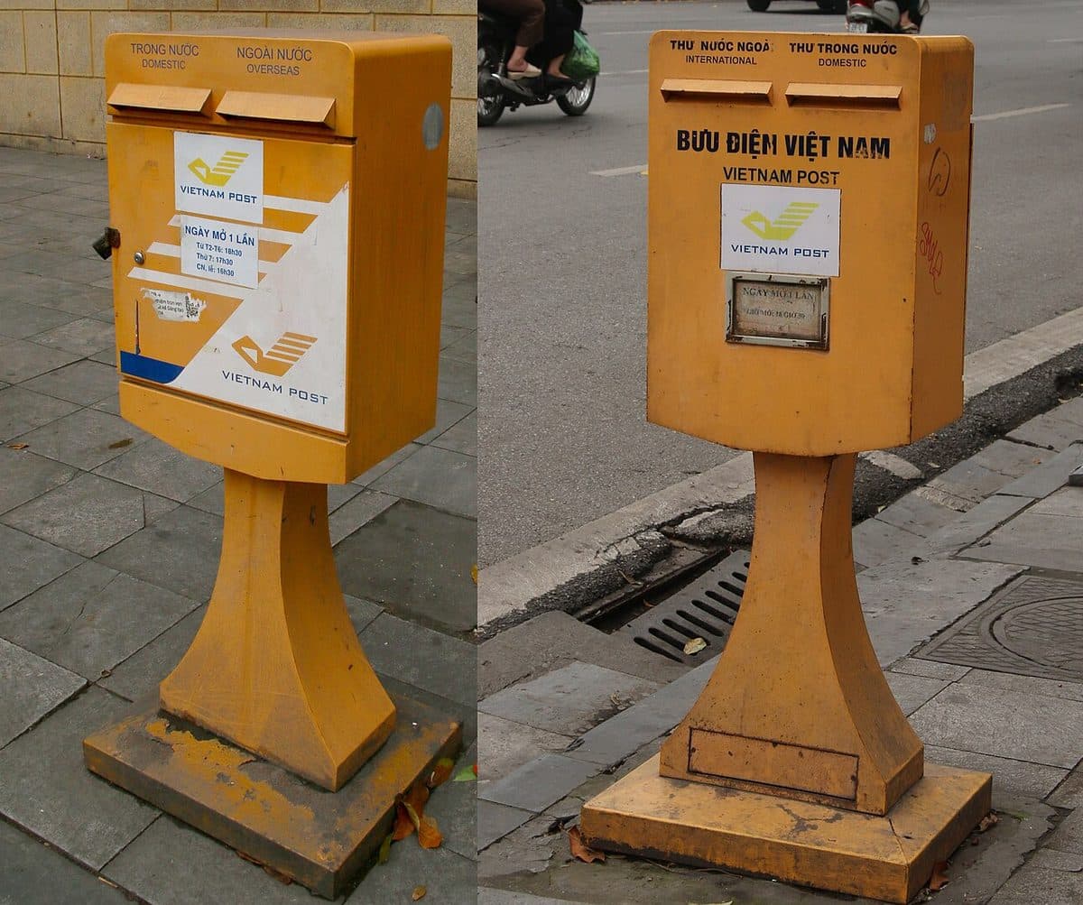 Yellow Vietnam Post mailboxes in Hanoi with separate slots for domestic and overseas letters