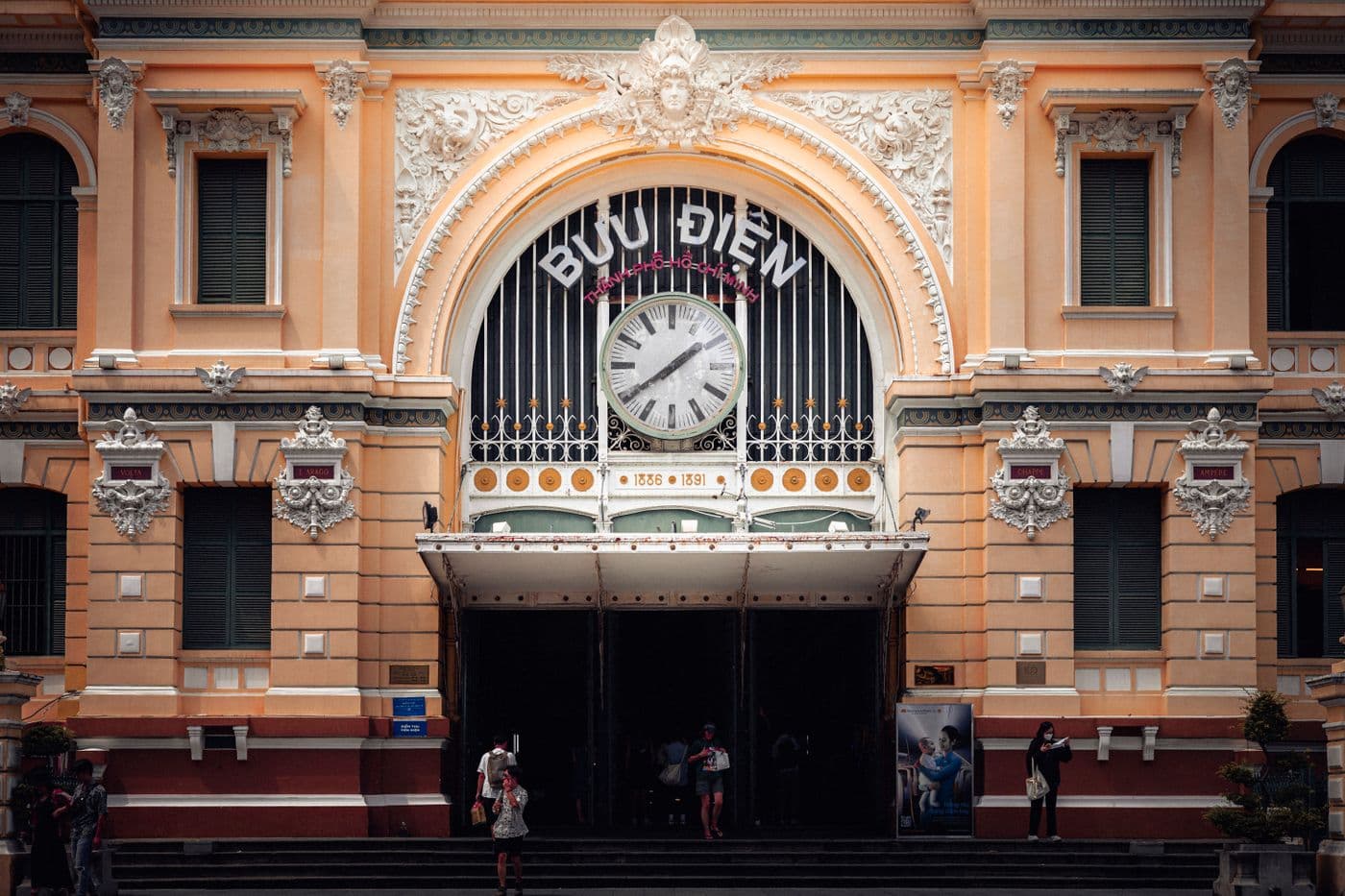 Street clock on the facade of Ho Chi Minh City central post office