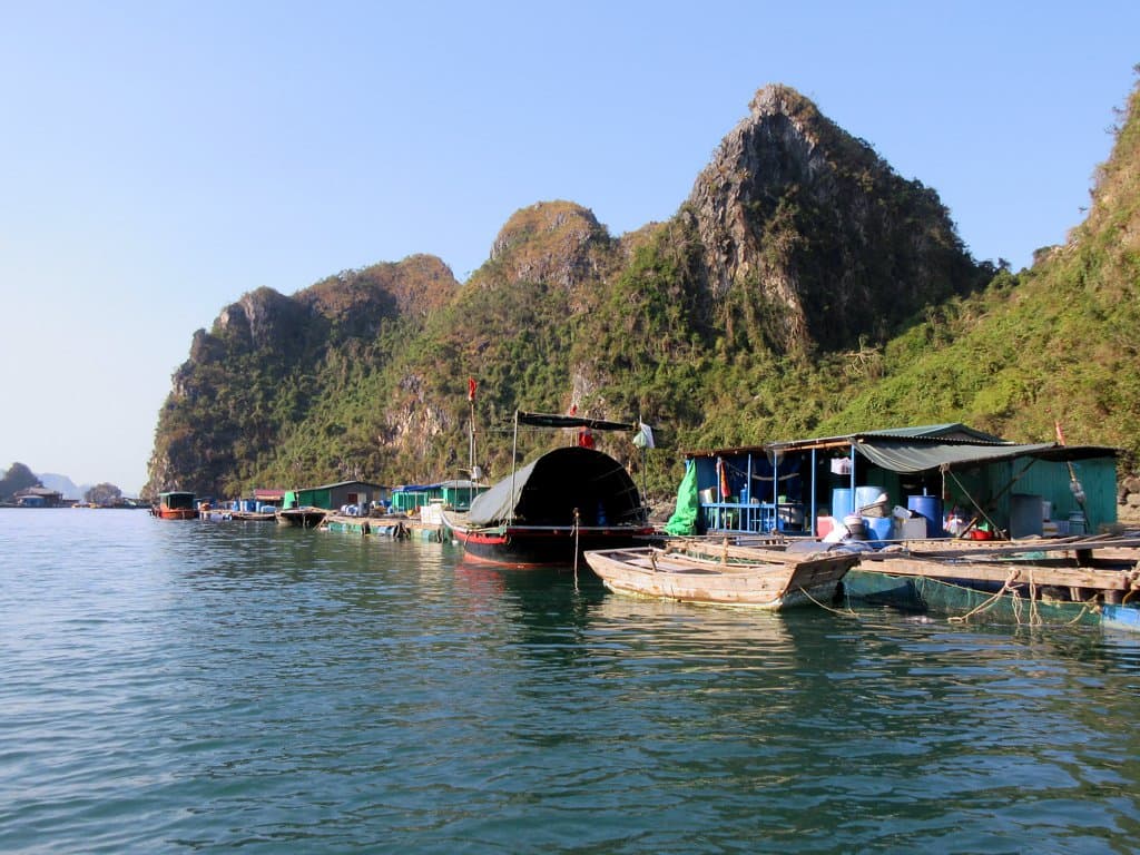 Colorful floating houses of Cua Van village in Halong Bay