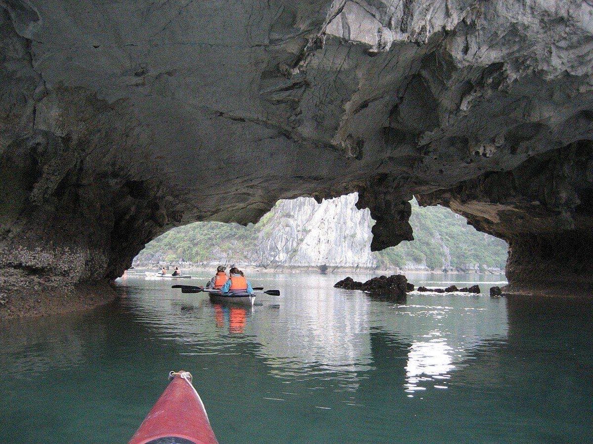 Kayak at the entrance of Luon Cave in Halong Bay
