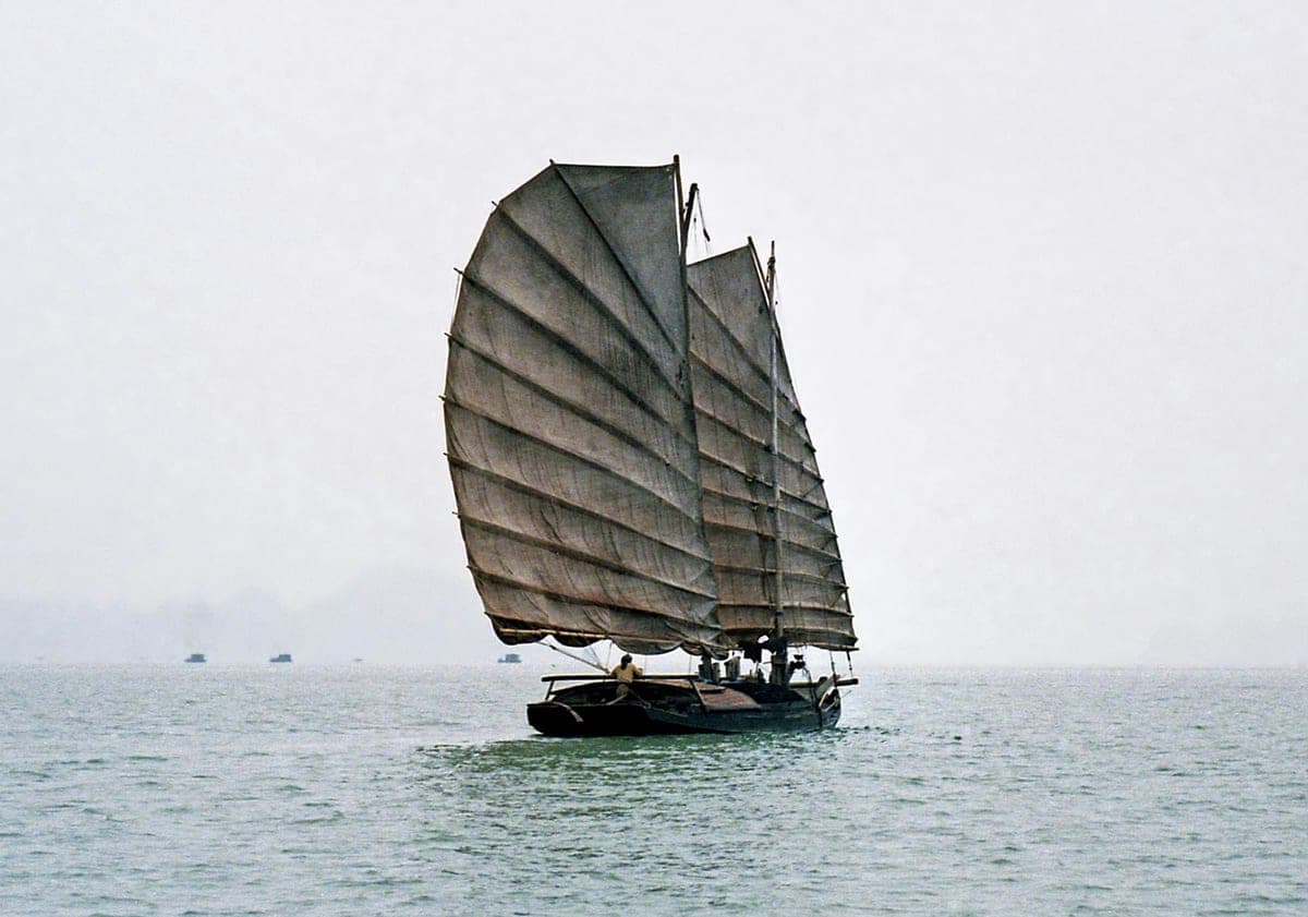 Wooden junk under three sails in Halong Bay, 1992