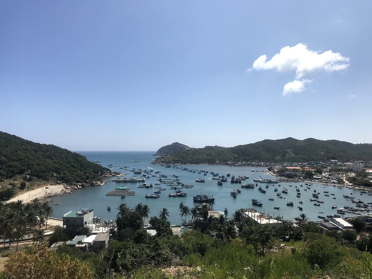 Vinh Hy Bay from above: hundreds of fishing boats, rafts and the village ringed by green hills