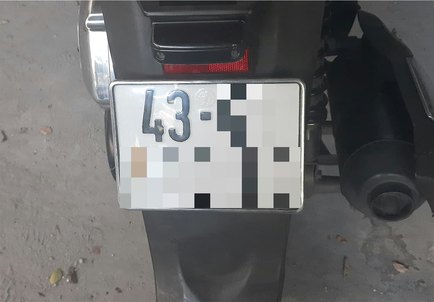 White Vietnamese motorbike number plate with Da Nang code 43, other characters hidden