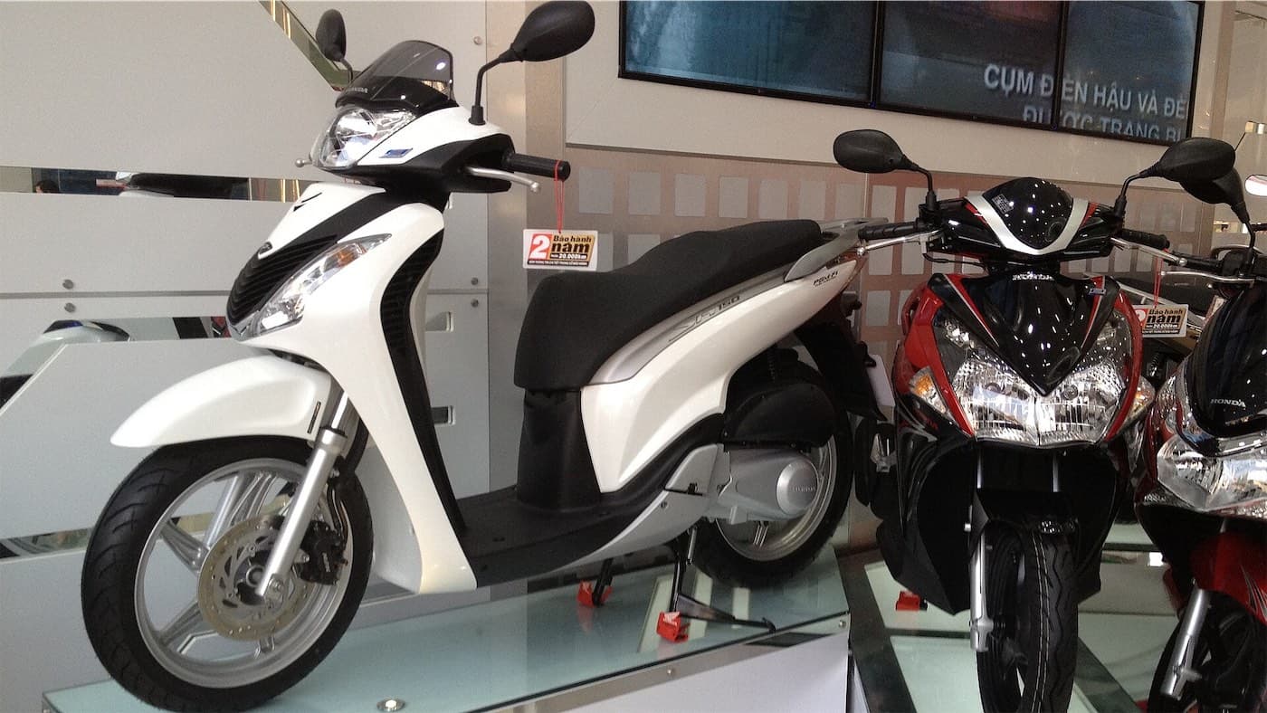 New Honda scooters on display in a showroom in Hanoi