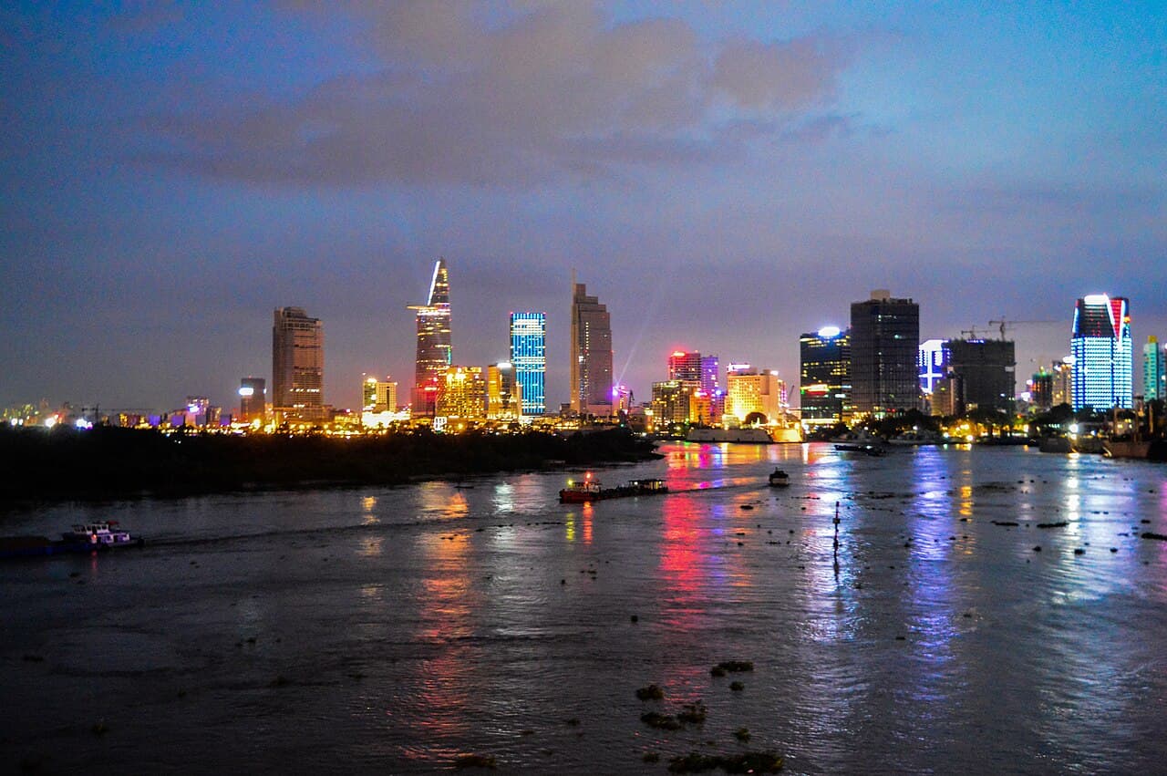 Downtown Ho Chi Minh City skyline and the Saigon River at dusk