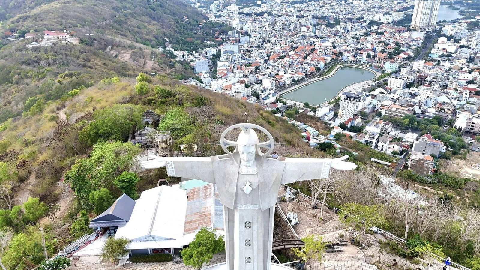 The hilltop Christ the King statue above Vung Tau and the dense town below